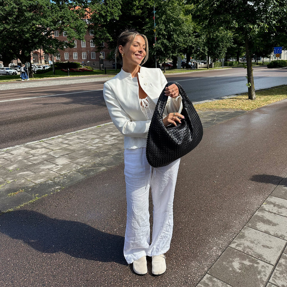 Jade – Borsa a mano intrecciata di lusso